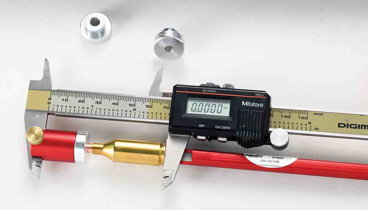 Inserts for various bullet diameters allow measurements to be taken on the bullet’s ogive if desired. In this instance, the measurement is zeroed on the caliper.